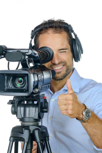 young-man-with-professional-movie-camera-scaled-1.jpg